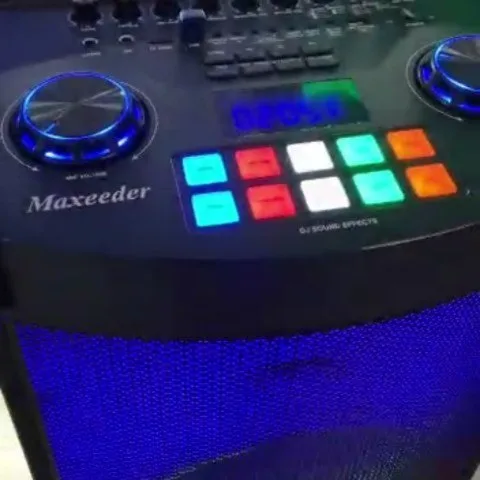 اسپیکر Maxi Box کارائوکه با هشت دکمه افکت مکسیدر، رنگ مشکی و آبی، جنس پلاستیک، پنل کنترل DJ