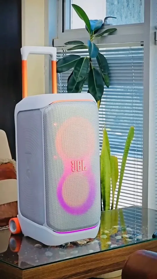 اسپیکر پارتی‌باکس سفید JBL، رنگ نارنجی و بنفش، جنس پلاستیک، چرخ‌دار، دسته‌دار