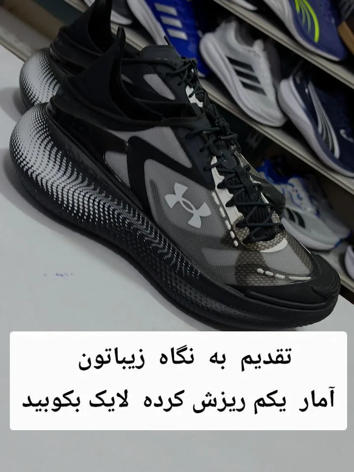 کتانی رانینگ آکبند آندر آرمور، رنگ مشکی، سفید و طوسی، جنس پارچه و پلاستیک، کتانی بندی، تخت